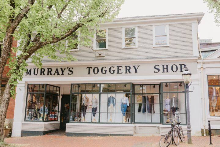 retail clothing storefront with multiple window displays